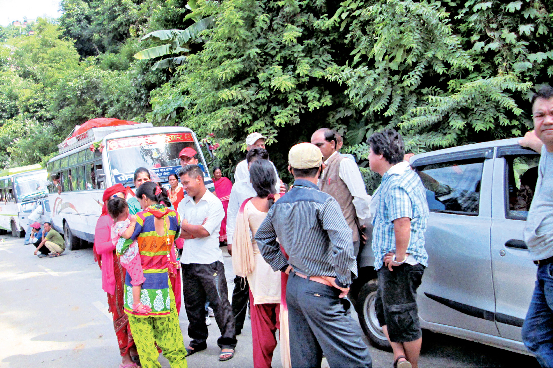 Passengers stranded after Prithvi highway was closed after Purna Bahadur Ale's murder, in Damauli, Tanahun, on Sunday.