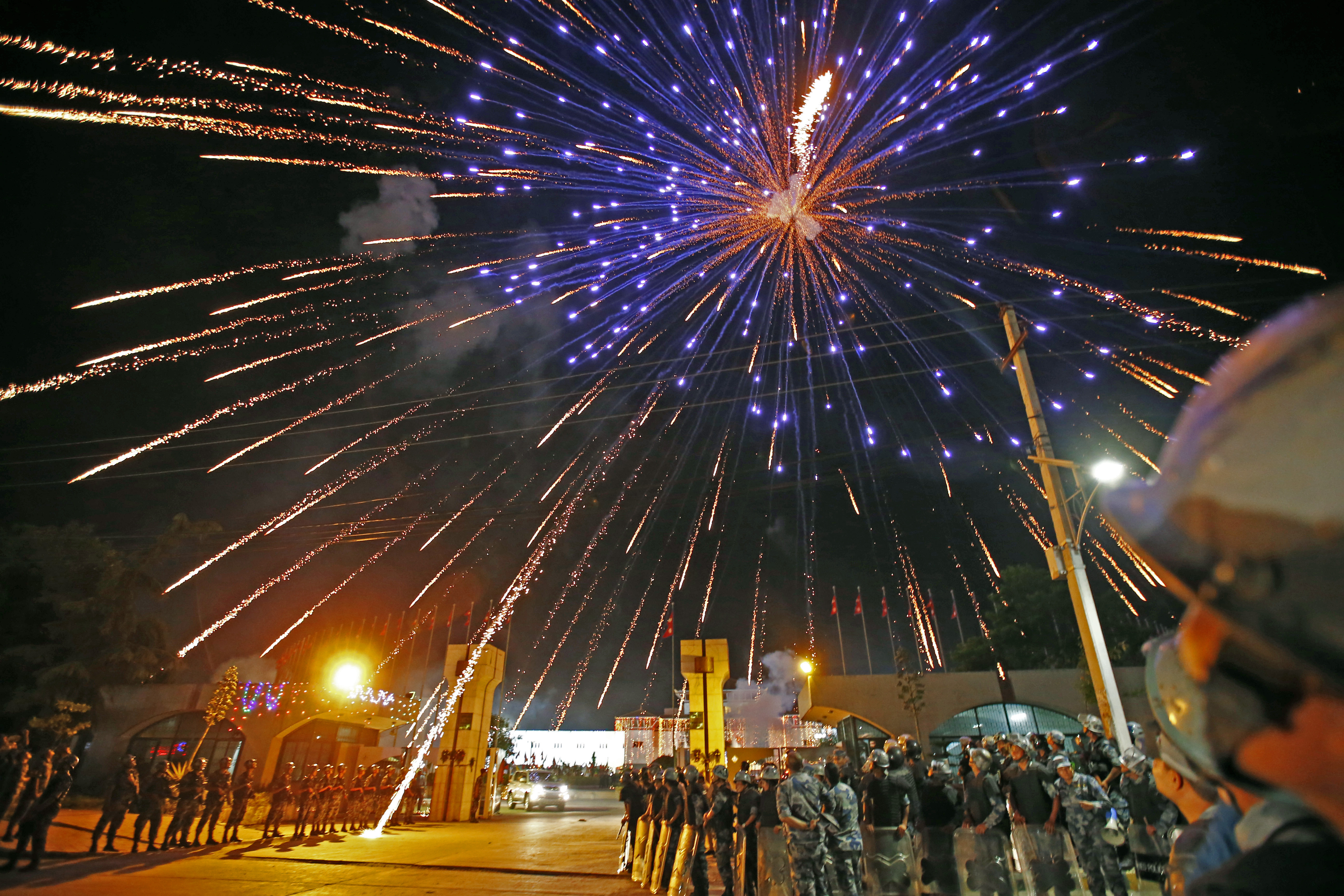 Fireworks are seen lighted inside the Constitutent Assembly building after the end to promulgate the new Constitution in New Baneshwor, Kathmandu on Sunday. Photo:Skanda Gautam
