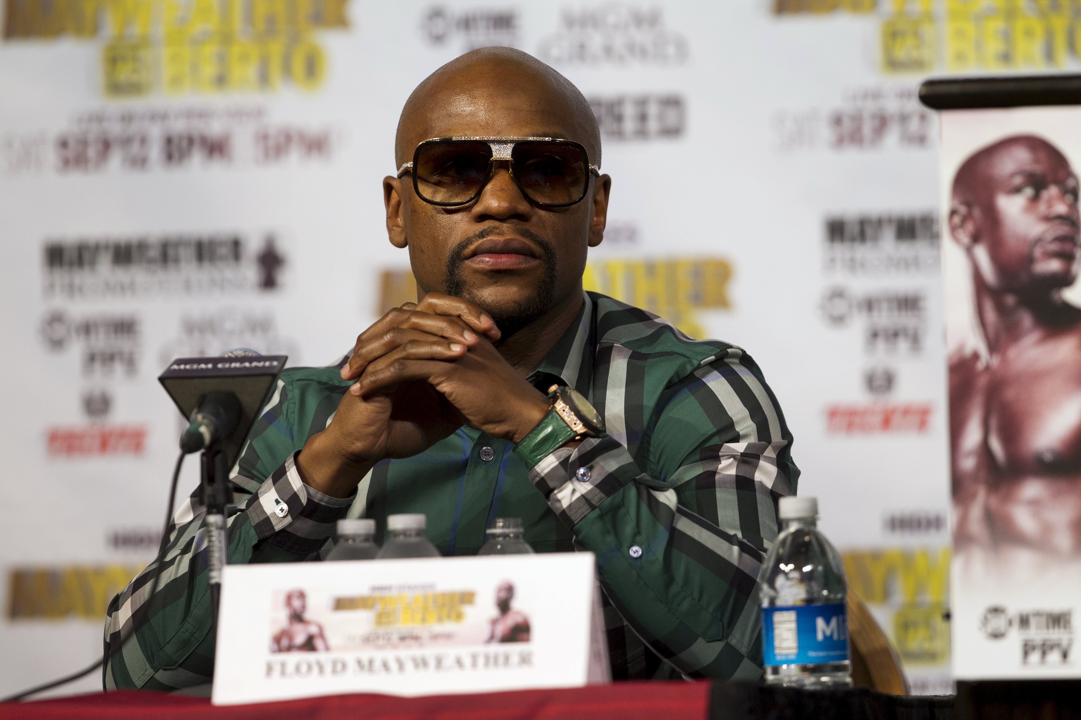 Undefeated WBC/WBA welterweight champion Floyd Mayweather Jr. attends a news conference at MGM Grand Hotel &amp; Casino in Las Vegas September 9, 2015. Mayweather will defend his titles against challenger Andre Berto at the MGM Grand Garden Arena on Sept. 12 in what he says will be his final fight. REUTERS/Las VegasSun/Steve Marcus