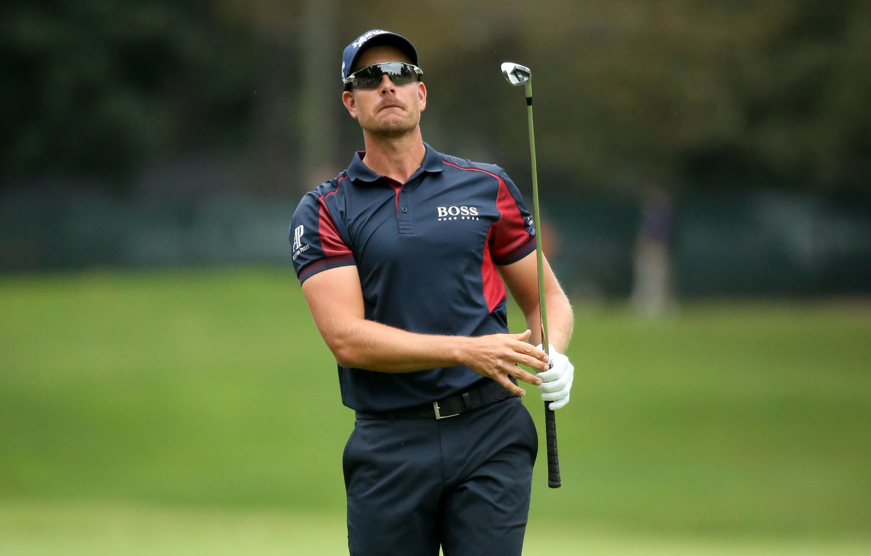 Sep 24, 2015; Atlanta, GA, USA; Henrik Stenson watches his shot from the fourteenth fairway during the first round of the Tour Championship by Coca-Cola at East Lake Golf Club. Mandatory Credit: Jason Getz-USA TODAY Sports