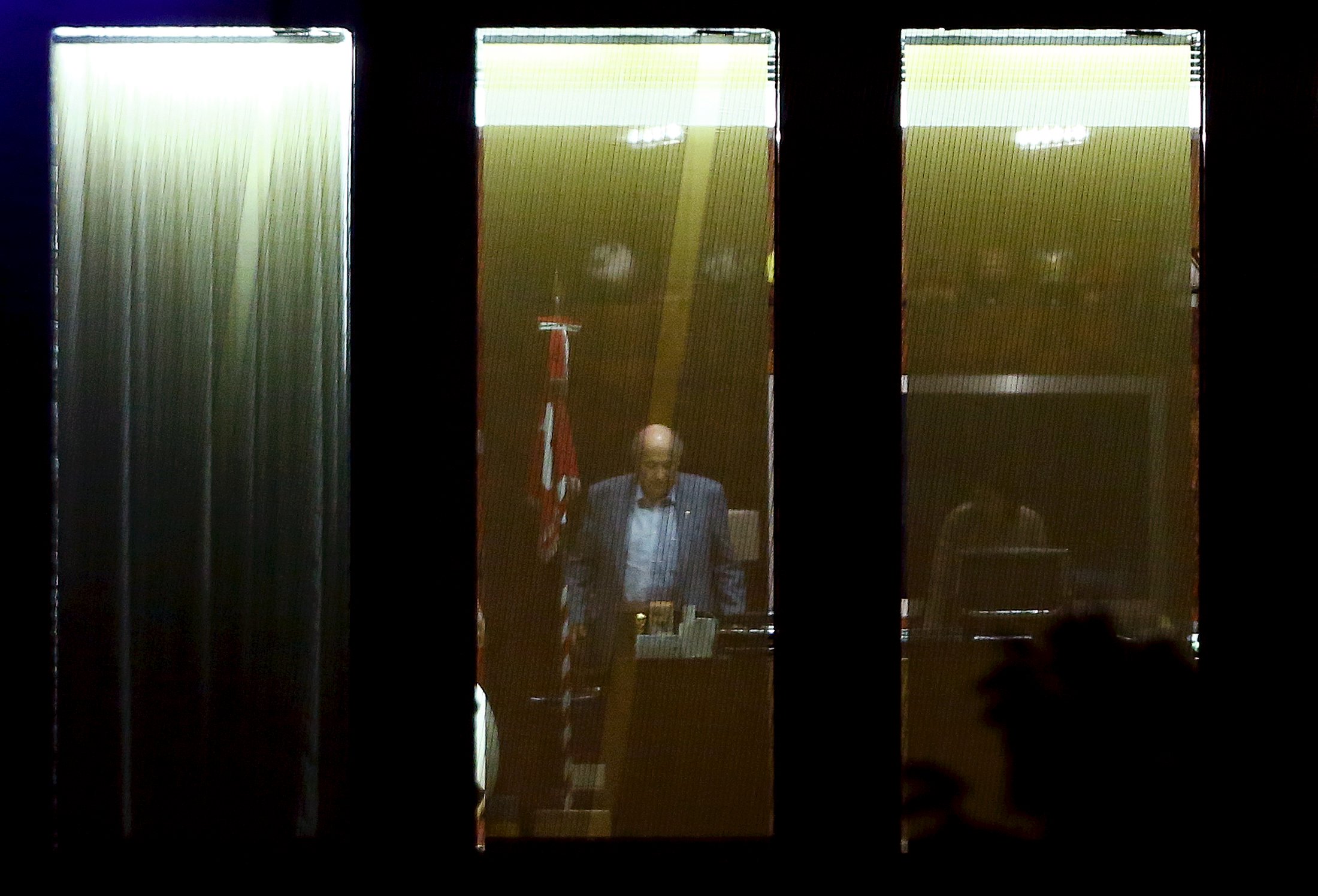 FIFA President Sepp Blatter stands in an office at the FIFA headquarters after a meeting of the FIFA executive committee in Zurich, Switzerland September 25, 2015. Swiss prosecutors have opened a criminal investigation into Sepp Blatter, the head of world soccer body FIFA, on suspicion of criminal mismanagement and misappropriation of funds, the Swiss attorney general's office said on Friday. It said Blatter was interrogated after a meeting of FIFA's executive committee in Zurich, and authorities carried out a search at the organization's headquarters on Friday. REUTERS/Arnd Wiegmann       TPX IMAGES OF THE DAY