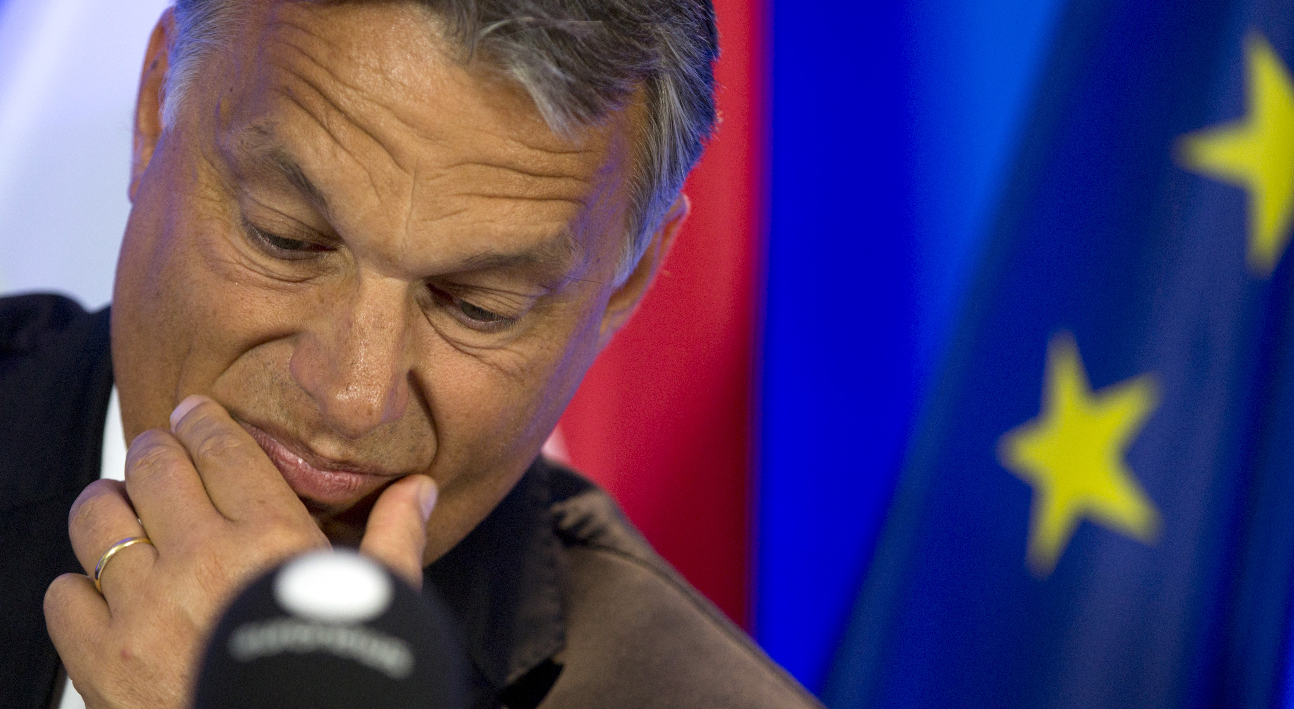 FILE - In this Thursday, Sept. 3, 2015 file photo, Hungarian Prime Minister Viktor Orban pauses before speaking during a media conference at the EU Council building in Brussels. The Baltic countries, as well as Hungary, Poland, Slovakia and the Czech Republic, have all rejected mandatory refugee quotas, often with the argument that they donu0092t want their relatively homogenous societies to become multicultural. EU officials and human rights groups say theyu0092ve been disappointed by the animosity toward asylum-seekers in countries from which hundreds of thousands of people fled communist dictatorships just decades ago. Viktor Orbanu0092s government is refusing to accept a single refugee under the EU plans and resisting their attempts to cross the country to reach more welcoming countries like Germany and Sweden. Slovakia has offered to accept 200 people - as long as most of them are Christians. Photo: AP