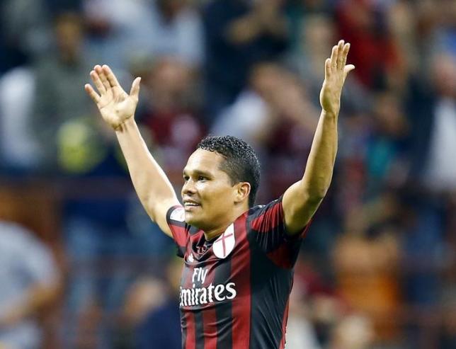 AC Milan's Carlos Bacca celebrates after scoring against Palermo during their Serie A soccer match at the San Siro stadium in Milan, Italy, September 19, 2015. REUTERS/Stefano Rellandini