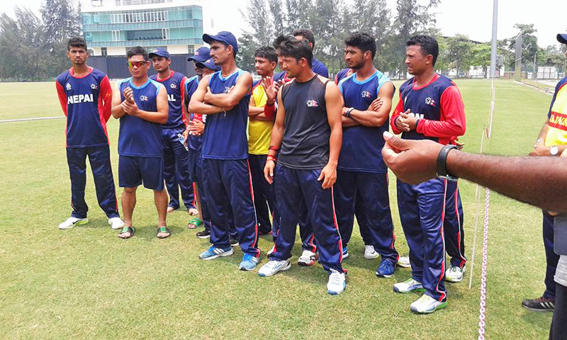 Nepali cricketers attend the presentation ceremony after their victory over Malaysia in the ACC U-19 Premier at the Bayuemas Oval grounds in Kuala Lumpur on Monday. Photo Courtesy:Satyajit Sarkar