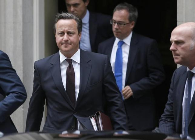 British Prime Minister, David Cameron leaves 10 Downing Street in London, Britain, September 7, 2015. Photo: Reuters