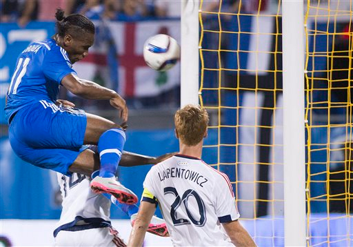 Montreal Impact's Didier Drogba (11) scores against the Chicago Fire during second half of a MLS soccer game in Montreal, Saturday, Sept. 5, 2015. Photo: AP