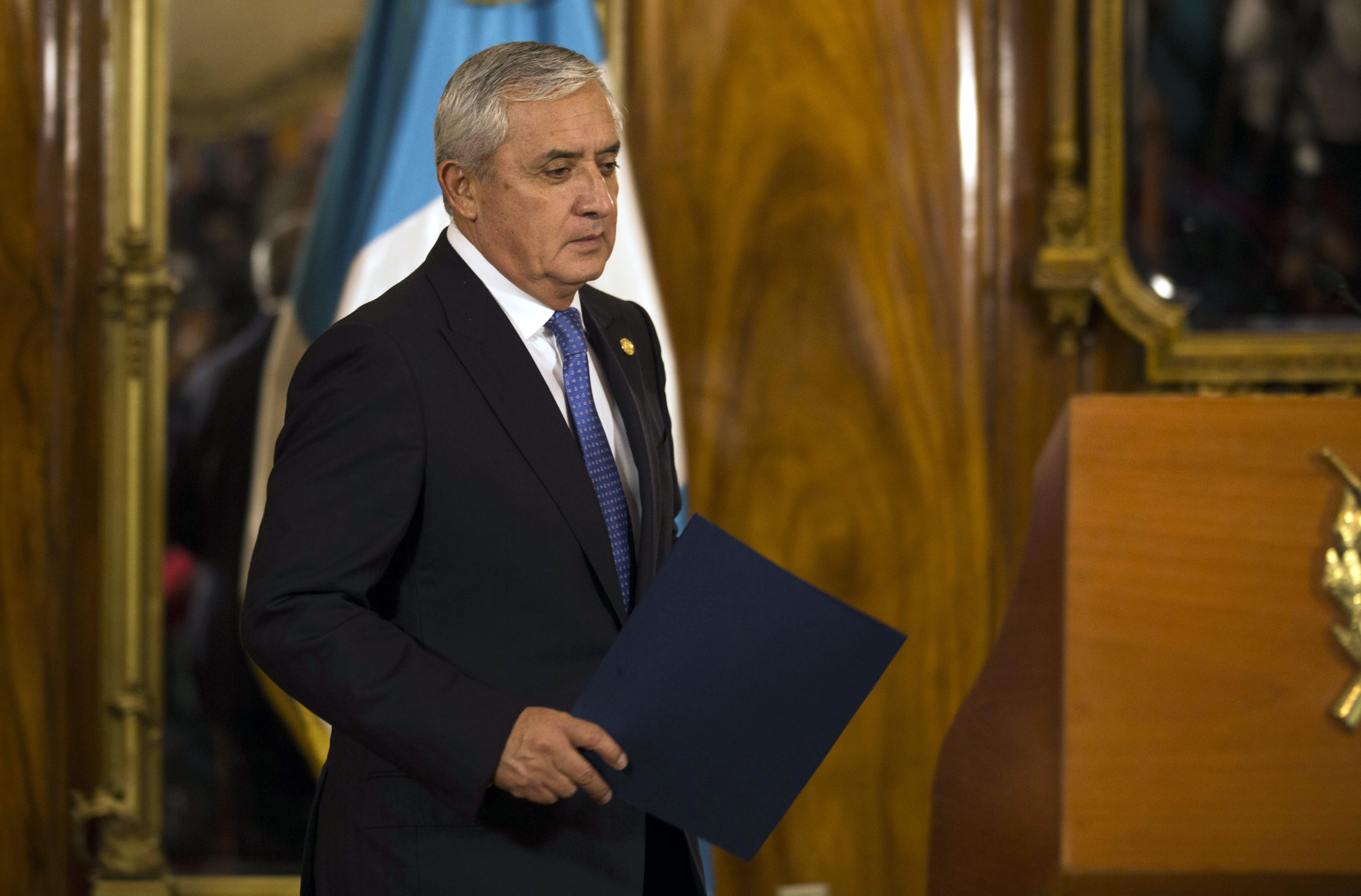Guatemala's President Otto Perez Molina arrives for a press conference in Guatemala City, Monday, Aug. 31, 2015. Photo: AP
