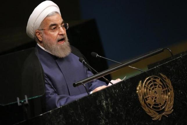 Iranian President Hassan Rouhani addresses attendees during the 70th session of the United Nations General Assembly at the U.N. headquarters in New York, September 28, 2015.   REUTERS/Carlo Allegri