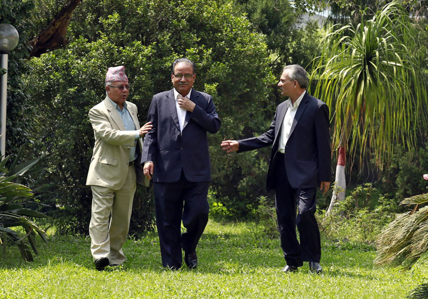 Leaders Madhav Kumar Nepal, Pushpa Kamal Dahal and Baburam Bhattarai at Baluwatar after the three-party meeting. Photo: RSS