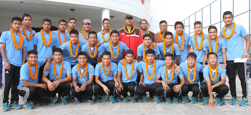 Players and officials of U-16 National football team who qualified for the finals of the AFC U-16 Championship take group photo after receiving cash prizes at ANFA Complex in Lalitpur on Monday, September 28, 2015. Photo: Udipt Singh Chhetry/THT