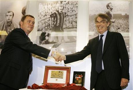 FILE - This is a Sunday May 11,2008 file photo of Inter Milan's President Massimo Moratti, right, as he shakes hand with Sheffield FC. president Richard Tims prior to the start of the Italian Serie A major league soccer match between Inter and Siena at the San Siro stadium in Milan, Italy. Sheffield FC are the world's first soccer team formed in October 1857. Qatar has invested in English football for the first time, in the unlikeliest of clubs, Sheffield FC . The recipient of Qatari cash is not a globally-recognized Premier League power but a tiny club playing seven divisions below the topflight. Photo: AP