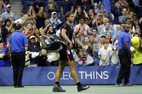 Rafael Nadal, of Spain, leaves the court after losing to Fabio Fognini, of Italy, during the U.S. Open tennis tournament in New York, Saturday, Sept. 5, 2015. Photo: AP
