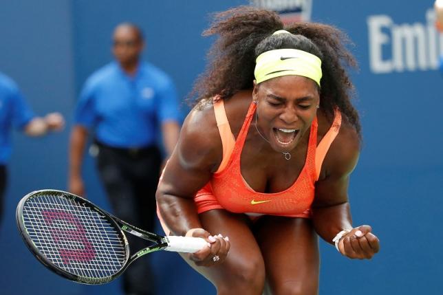 Sep 2, 2015; New York, NY, USA; Serena Williams of the United States reacts after winning the first set against Kiki Bertens of the Netherlands (not pictured) on day three of the 2015. Mandatory Credit: Geoff Burke-USA TODAY Sports
