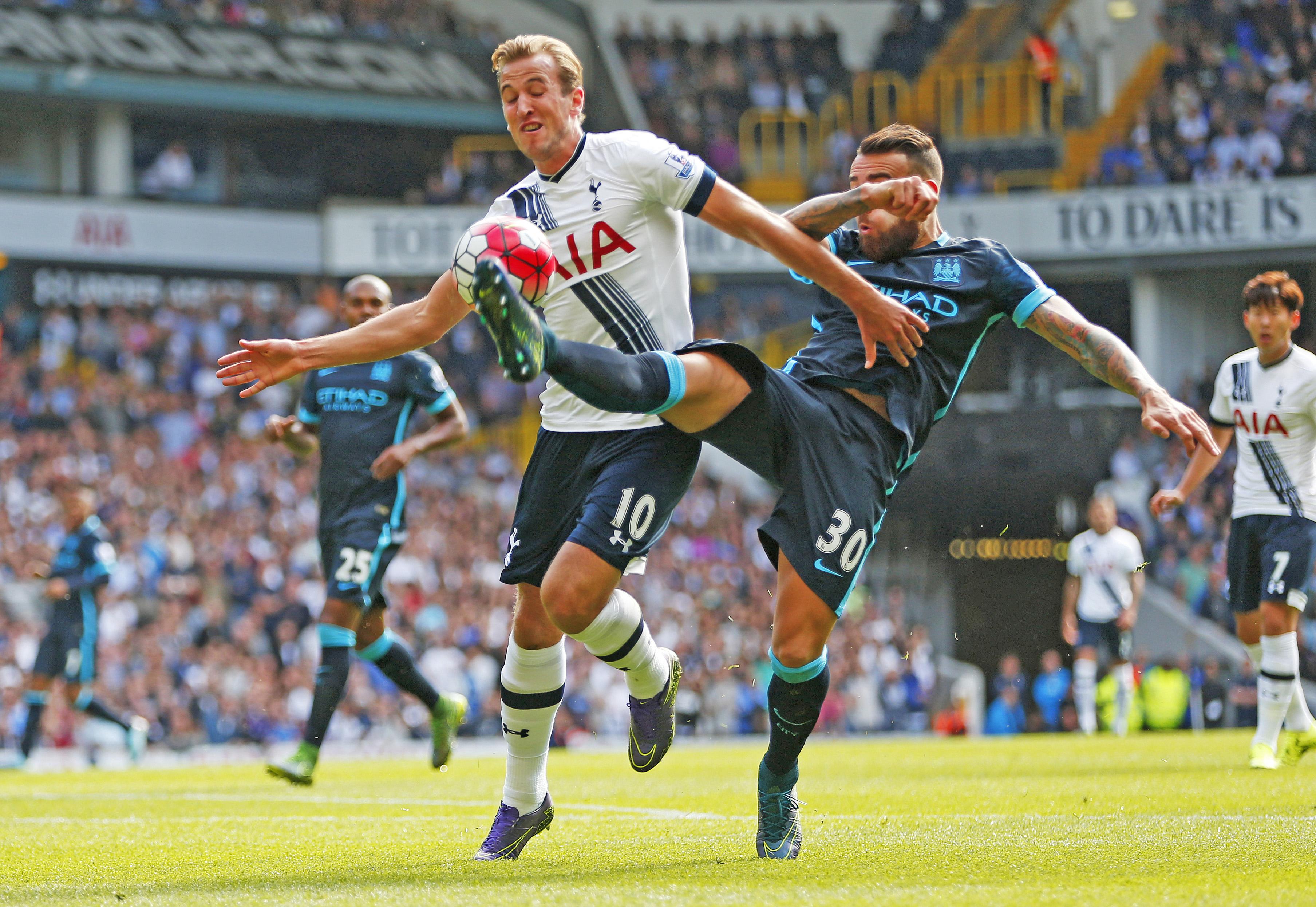 Manchester City's Nicolas Otamendi (right) struggles to reach the ball under pressure from Tottenham Hotspur's Harry Kane during their English Premier League match in London on Saturday. Tottenham won the match 4-1. Photo: Reuters