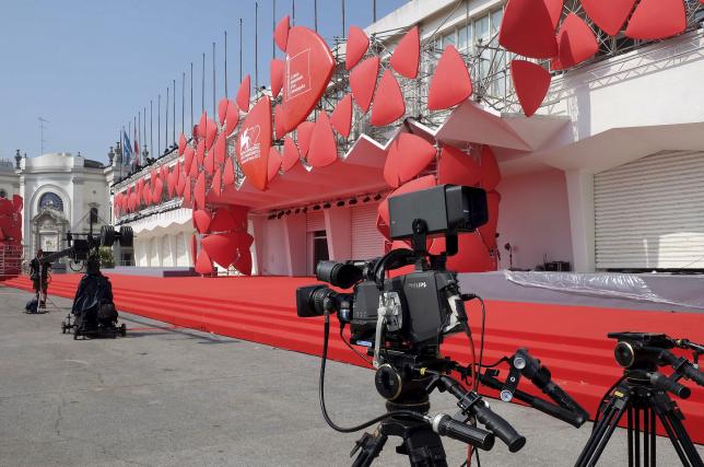 A camera is seen in front the entrance of the venue for the 72nd Venice Film Festival in Venice August 31, 2015. The Venice Film Festival will run from September 2 until September 12. REUTERS/Manuel Silvestri