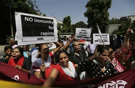 Activists of All India Democratic Women's Association shout slogans during a protest outside the Saudi Arabian embassy in New Delhi, India, Thursday, Sept. 10, 2015. Police in India were investigating complaints from two women that a Saudi Arabian diplomat raped them repeatedly and confined them in his home near New Delhi. He has claimed diplomatic immunity, and the Saudi embassy in a statement Wednesday denied all the allegations. Photo: AP