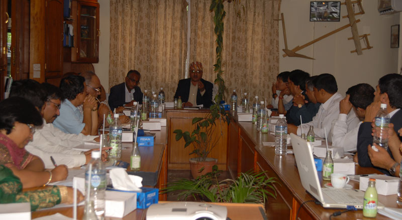 High officials of the Department of Food Technology and Quality Control, Department of Agriculture and Department of Livestock Services under the Ministry of Agricultural Development hold a meeting at the Project for Agriculture Commercialisation and Trade (PACT) Office in the Capital, on Thursday, September 17, 2015. The meeting, also attended by the MoAD Secretary Uttam Kumar Bhattarai (c), had discussed maintaining sanitary and phytosanitary standards as well as quality of food products produced in Nepal. Photo: PACT 