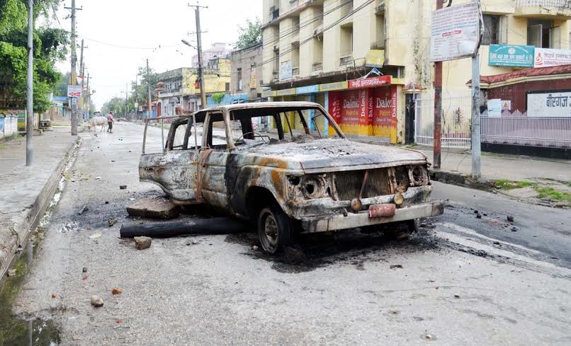 A car burnt by the demonstrators in front of the Inland Revenue Office in Birgunj on Tuesday, September 1, 2015. Photo: THT