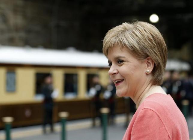 Scotland's First Minister Nicola Sturgeon awaits the arrival of Queen Elizabeth and Prince Philip at Edinburgh Waverley Station in Scotland, Britain September 9, 2015.  Photo: REUTERS