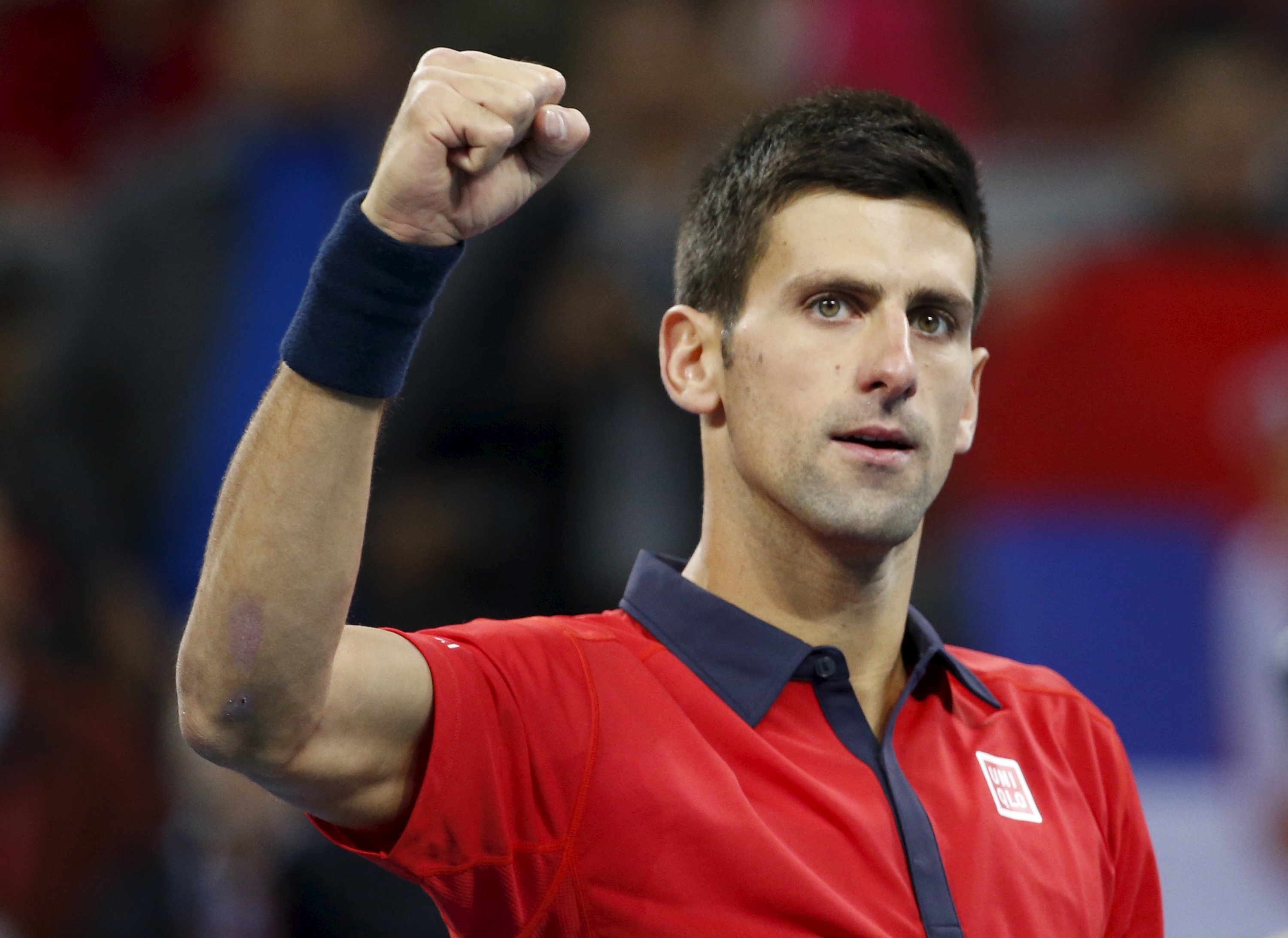 Novak Djokovic of Serbia reacts after beating John Isner of U.S. during their men's singles match at the China Open tennis tournament in Beijing, China, October 9, 2015.    REUTERS/Kim Kyung-Hoon