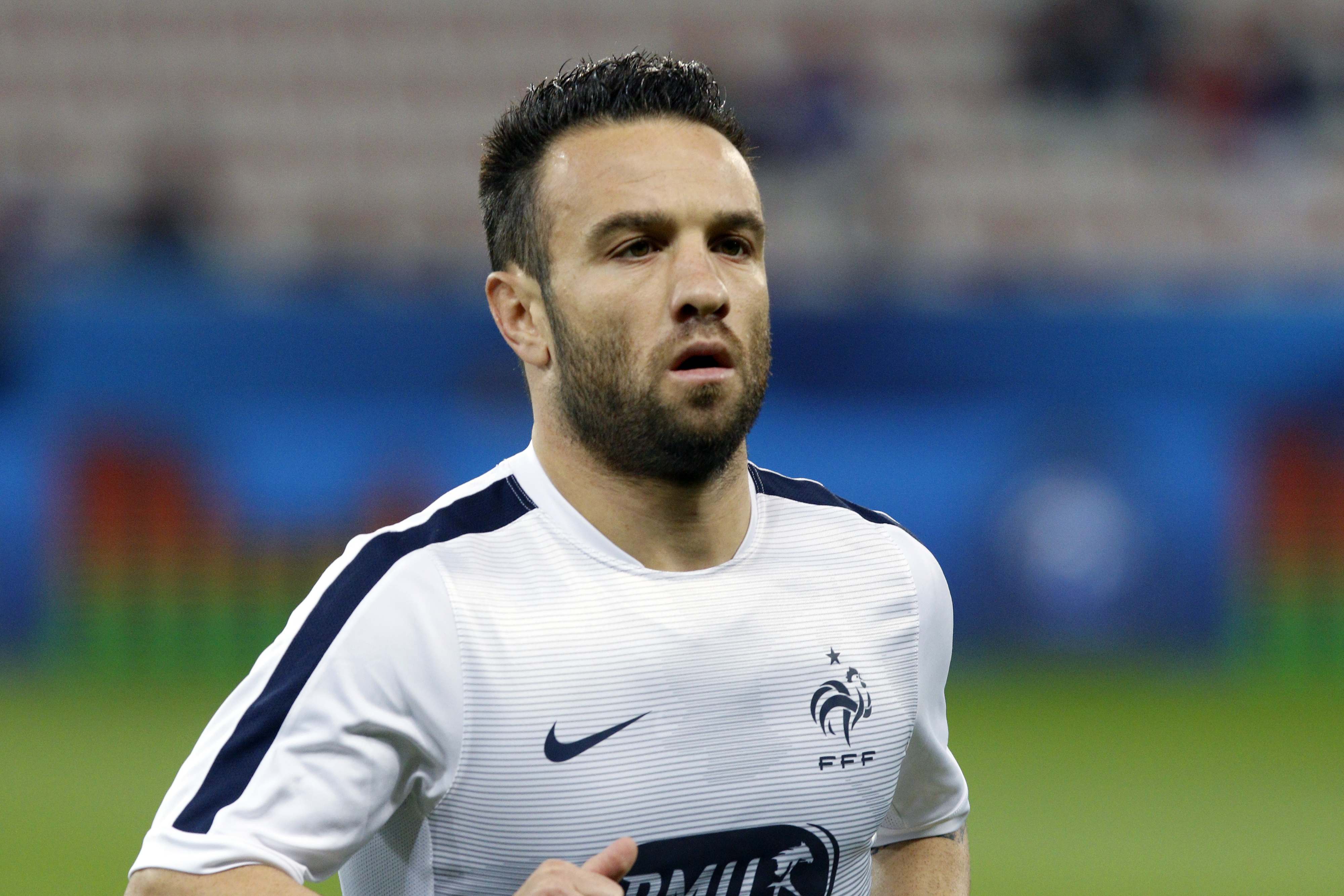 France's national soccer player Mathieu Valbuena is seen before their friendly soccer match against Armenia at Allianz Riviera stadium in Nice, France, in this October 8, 2015. file photo. French police have arrested four people in an inquiry into a suspected attempt to bribe France soccer international Mathieu Valbuena with the help of sex video footage, a police official said on Tuesday October 13, 2015. Among the four being held in custody after arrests in Paris and Marseille is Djibril Cisse, the former French international striker, the official said.  Picture taken October 8, 2015.  REUTERS/Philippe Laurenson/Files