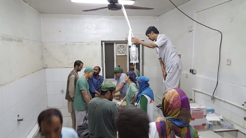 Afghan (MSF) surgeons work inside a Medecins Sans Frontieres (MSF) hospital after an air strike in the city of Kunduz, Afghanistan in this October 3, 2015 MSF handout photo. Photo: Medecins Sans Frontieres via Reuters