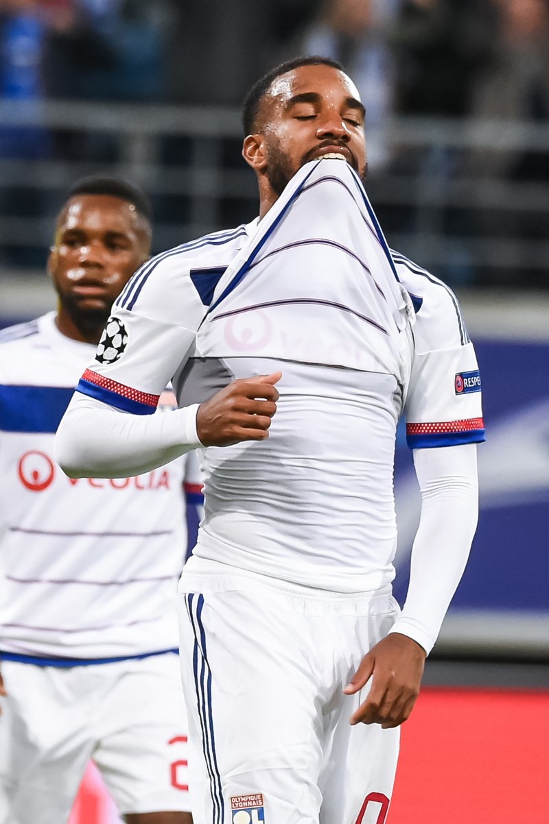 Lyon's Alexandre Lacazette reacts after he missed a penalty during the Champions League Group H soccer match between KAA Gent and Lyon at the Ghelamco Arena in Gent, Belgium, Wednesday, Sept. 16, 2015. (AP Photo/Geert Vanden Wijngaert)