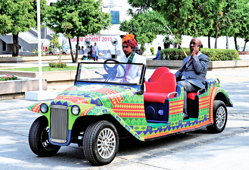 An African delagate talks on the phone as he arrives for the Third India-Africa Forum Summit at the Indira Gandhi stadium in New Delhi on October 26, 2015. Photo: AFP