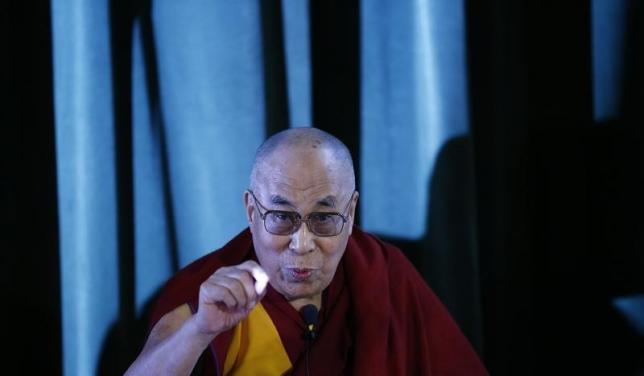 Tibetan spiritual leader, the Dalai Lama speaks during a news conference at Magdalene College in Oxford, Britain September 14, 2015.   REUTERS/Darren Staples/Files