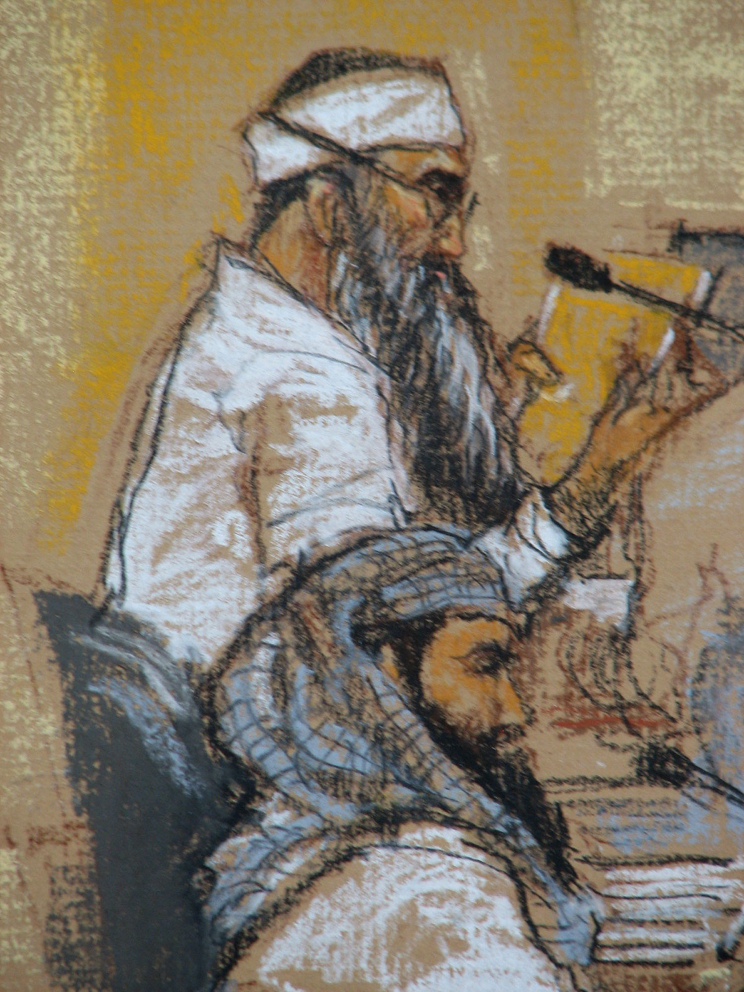 In this Jan. 21, 2009 photo of a sketch by court artist Janet Hamlin, and reviewed by the US Military, Walid bin Attash, bottom, and Khalid Sheik Mohammad attend a hearing at the US Military Commissions court for war crimes at the US Naval Base in Guantanamo Bay, Cuba. On Monday, Oct. 19, 2015. Photo: AP/ File
