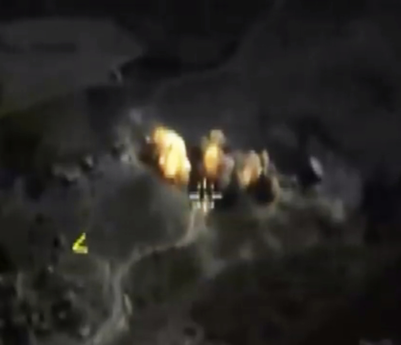 In this photo made from the footage taken from Russian Defense Ministry official web site on Saturday, Oct. 3, 2015 a bomb explosion is seen in Syria. Pentagon officials urged the Russian military on Thursday to focus its airstrikes in Syria on Islamic State fighters rather than opponents of Syrian President Bashar Assad, U.S. administration officials said. (Russian Defense Ministry Press Service via AP)