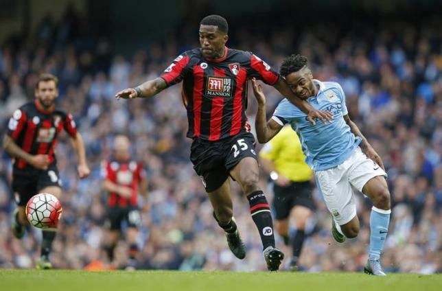 Football - Manchester City v AFC Bournemouth - Barclays Premier League - Etihad Stadium - 17/10/15nManchester City's Raheem Sterling and Bournemouth's Sylvain DistinnReuters / Andrew YatesnLivepic