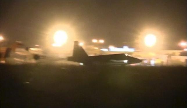 A frame grab taken from footage released October 1, 2015, shows a Russian military jet taxiing on runway shortly after the landing in Syria. REUTERS/Reuters TV/Pool