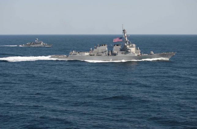 USS Lassen (DDG 82), (R) transits in formation with ROKS Sokcho (PCC 778) during exercise Foal Eagle 2015, in waters east of the Korean Peninsula, in this March 12, 2015, handout photo provided by the U.S. Navy.   REUTERS/U.S. Navy/Mass Communication Specialist 1st Class Martin Wright/Handout via Reuters