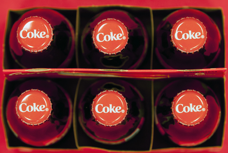 This photo shows the tops of Coca-Cola 8 oz. bottles in Doral, Florida on July 15, 2013. Photo: AP/ File