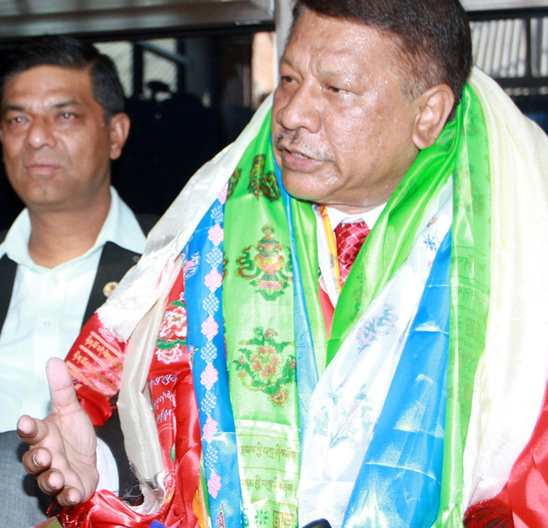 Nepali Congress leader Prakash Man Singh, who was a Deputy Prime Minister then, at the Tribhuvan International Airport after returning from the 70th United Nations General Assembly, held in New York of the United States, in Kathmandu, on Sunday, October 4, 2015. Photo: RSS
