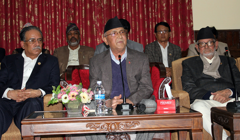 Prime Minister KP Sharma Oli, flanked by Nepali Congress President Sushil Koirala (right) and UCPN-Maoist Chairman Pushpa Kamal Dahal, speak at a luncheon organised by him, in Kathmandu, on Thursday, October 29, 2015. Photo: RSS