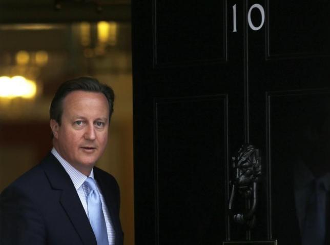 Britain's Prime Minister David Cameron prepares to greet President Nicos Anastasiades of Cyprus at Number 10 Downing Street in London, Britain September 18, 2015.  Photo: REUTERS
