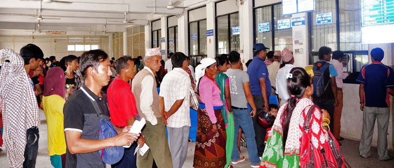 Locals lining up for OPD tickets at Western Regional Hospital, in Pokhara, on Tuesday.  
