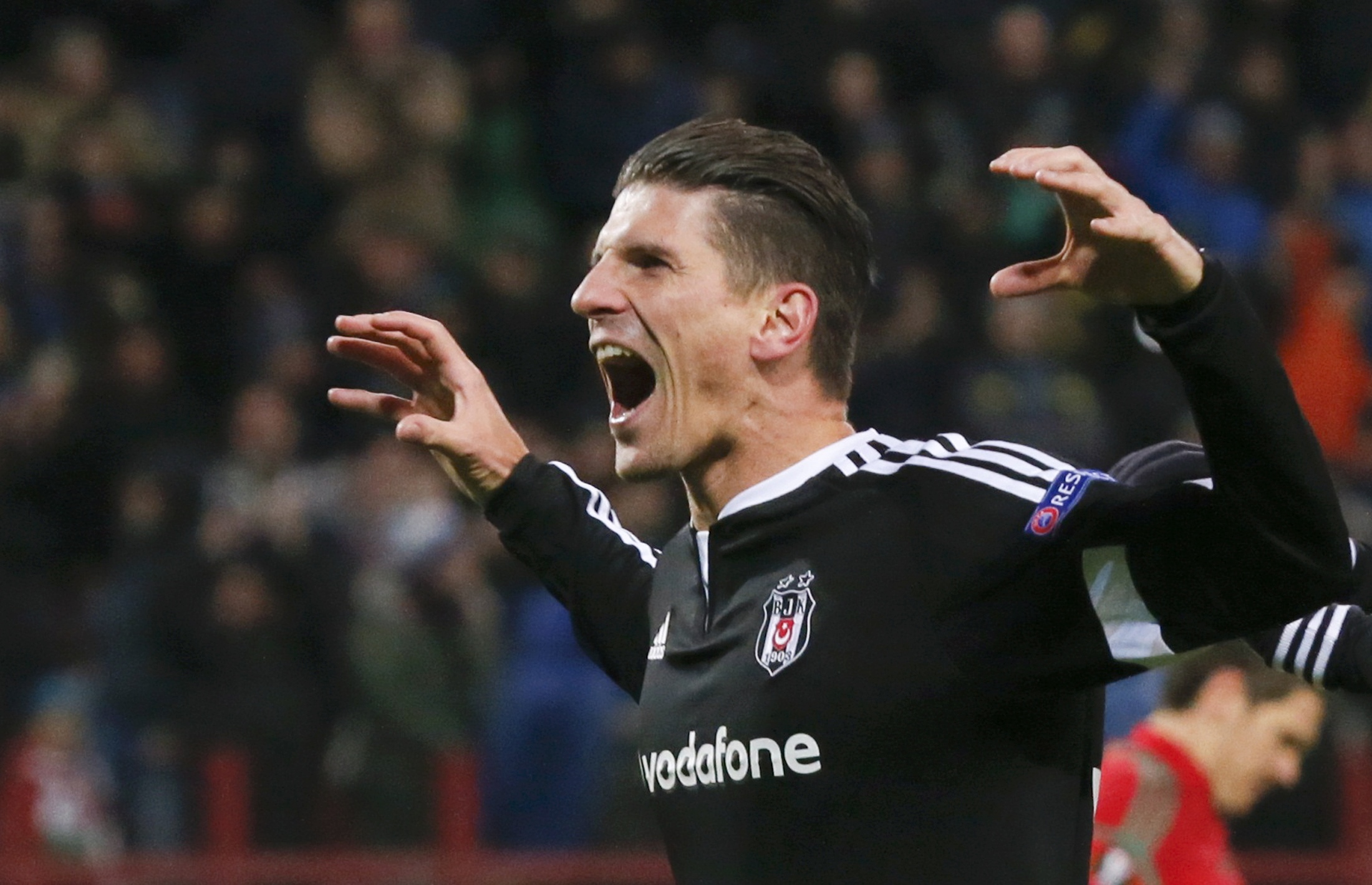Besiktas' Mario Gomez celebrates after scoring a goal during the Europa League group H soccer match against Lokomotiv in Moscow, Russia, October 22, 2015. REUTERS/Maxim Shemetov TPX IMAGES OF THE DAY