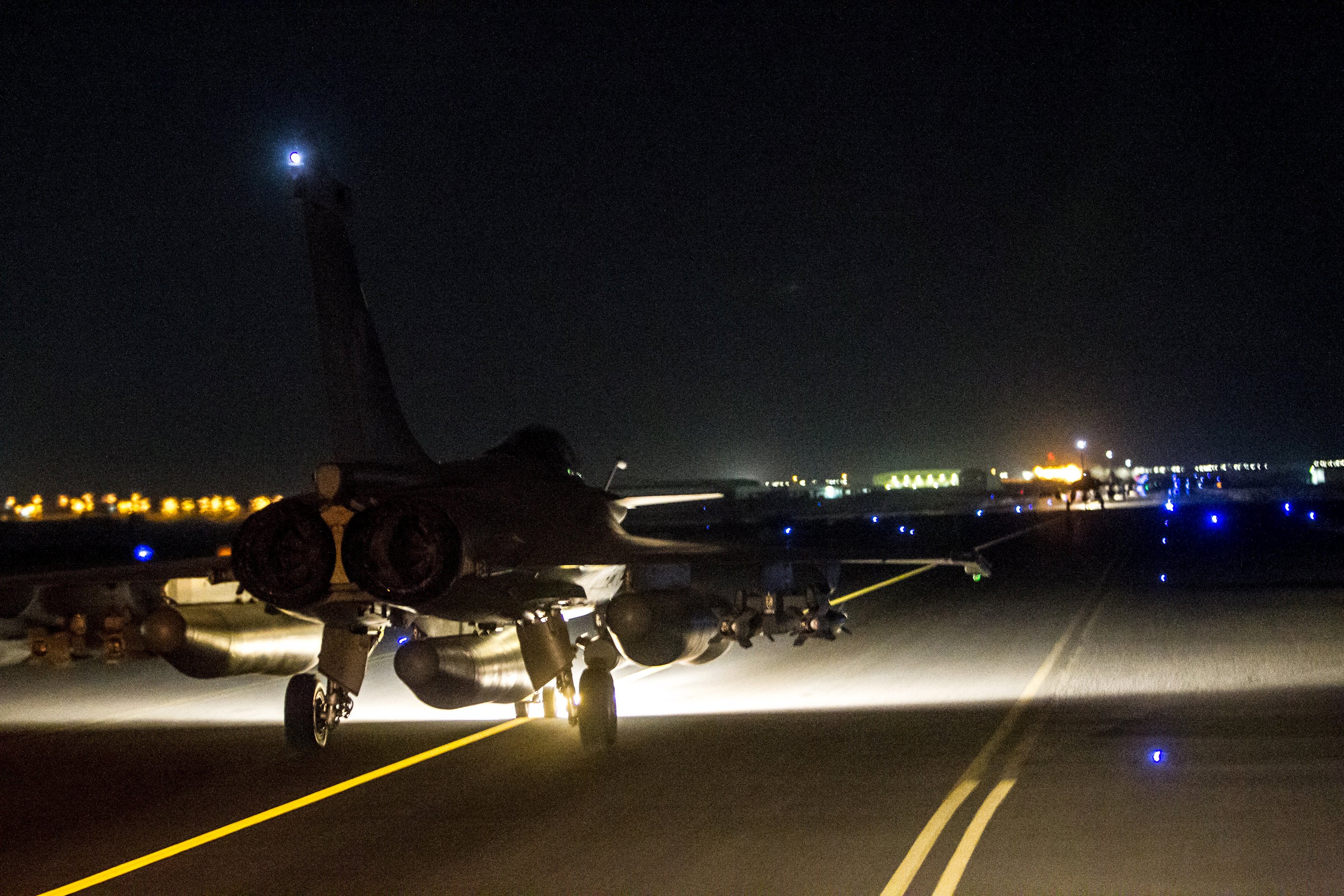 A French fighter jet taxis along the runway in an undisclosed location, in this handout picture released by the ECPAD late November 15, 2015. Photo: Reuters