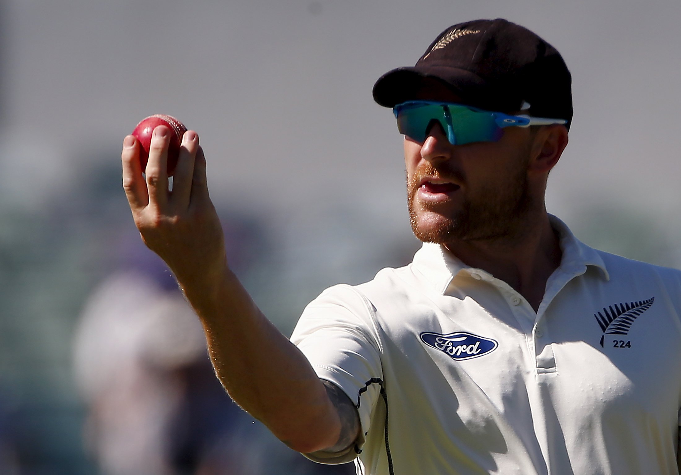 New Zealand captain Brendon McCullum inspects the ball during the fourth day of the second cricket test match against Australia at the WACA ground in Perth, Western Australia, November 16, 2015.      REUTERS/David Gray