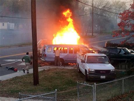 Flames rise from a vehicle following a fatal crash Sunday, Nov. 8, 2015, in Hyattsville, Md. The accident occurred late Sunday afternoon on a road in Hyattsville just northeast of Washington. Photo: AP