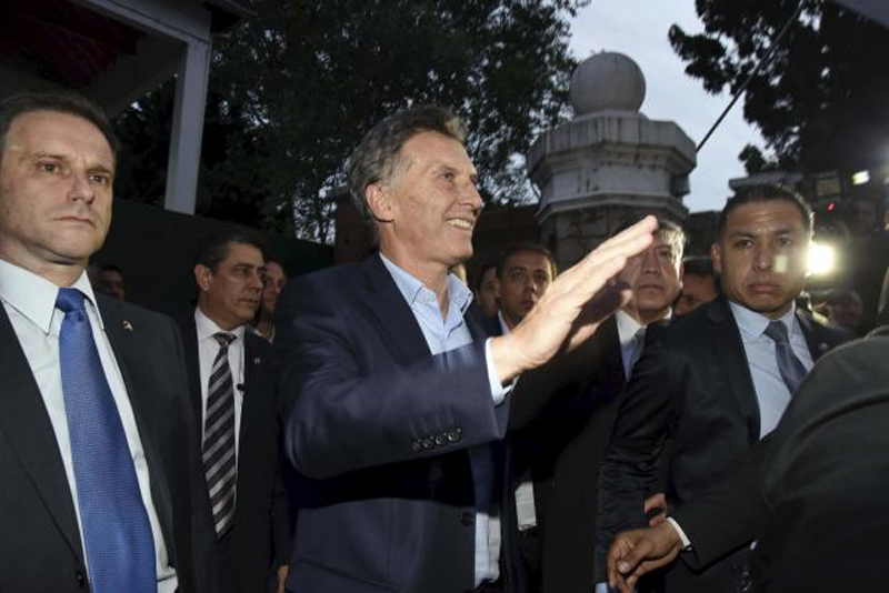 Argentina's President-elect Mauricio Macri (C) leaves after meeting with outgoing president Cristina Fernandez de Kirchner in Buenos Aires, November 24, 2015, in this handout courtesy of the Cambiemos (Let's Change) coalition. Photo: Reuters