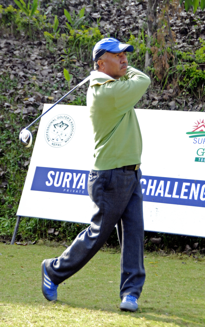 Deepak Thapa Magar watches his shot during the second round of the Surya nNepal Challenge at the Royal Nepal Golf Club in Kathmandu on Wednesday. Photo: Naresh Shrestha/ THT