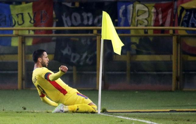 Romania's Florin Andone celebrates after scoring. Reuters/Stefano Rellandini