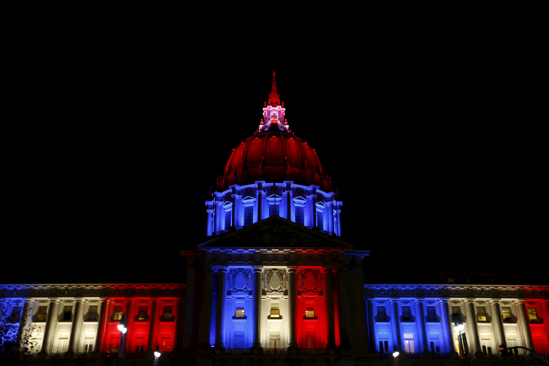 San Francisco City Hall is lit up with blue, white and red, the colors of the French flag, following the Paris terror attacks, in San Francisco, California November 13, 2015. photo: REUTERS