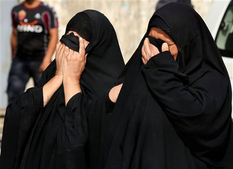 Women mourn during the funeral of Ahmad Chalabi in Baghdad, Iraq on Wednesday, November 4, 2015. Photo: AP