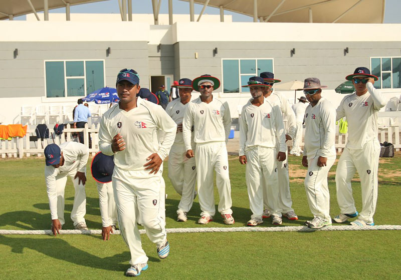 Nepali players entering the field on Day II of the two-day match against Hong Kong in Abu Dhabi on November 6, 2015. Photo: CAN