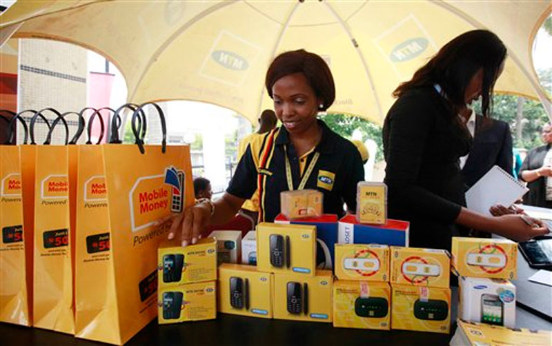 Staff of MTN Nigeria work during the launch of mobile number portability in Lagos, Nigeria on Monday April. 22, 2013. Photo: AP
